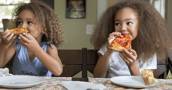 Whirlpool Two Girls Eating Pizza